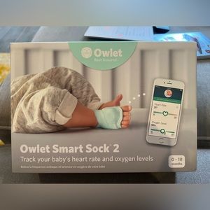 Owlet Smart Sock 2. Open box, Not used. Contents: Sizes 1-3, base, charger.